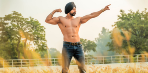 Shirtless Man in Blue Denim Jeans