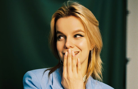 woman covering her mouth